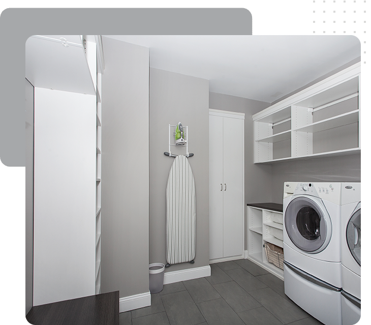 A room with a white washer and dryer.